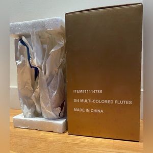 NWT Macy’s Set of 4 Multi colored Flutes- Blue, Red, Brown & Green.